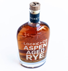 Locke + Co Distilling Aspen Aged Rye with 3Forks Ranch logo engraved in the bottle