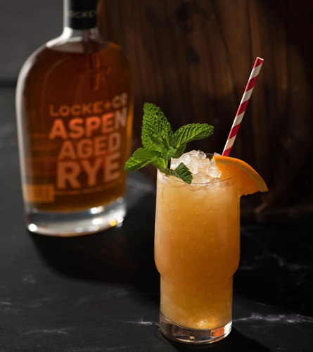 The Locke Cocktail with a Bottle of Locke + Co Aspen Aged Rye Whiskey